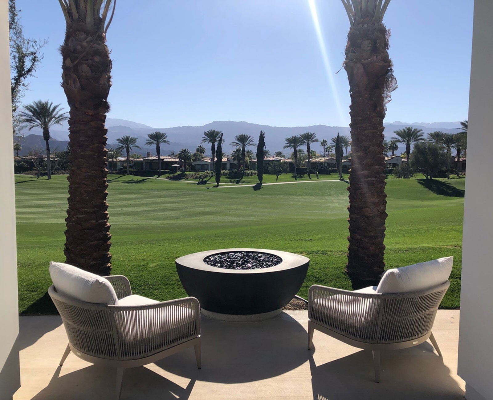 Ovale Edge 55" x42" x 18" h with a circular opening in Ebony Fire Bowls / fire Pits Concrete Creations 