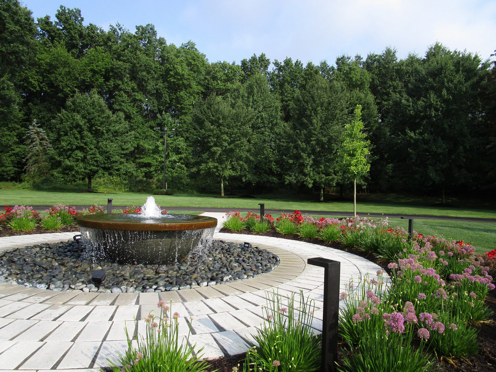 The Contemporary Rounded fire bowl in Granite Green Water Features ConcreteCreationsLA 